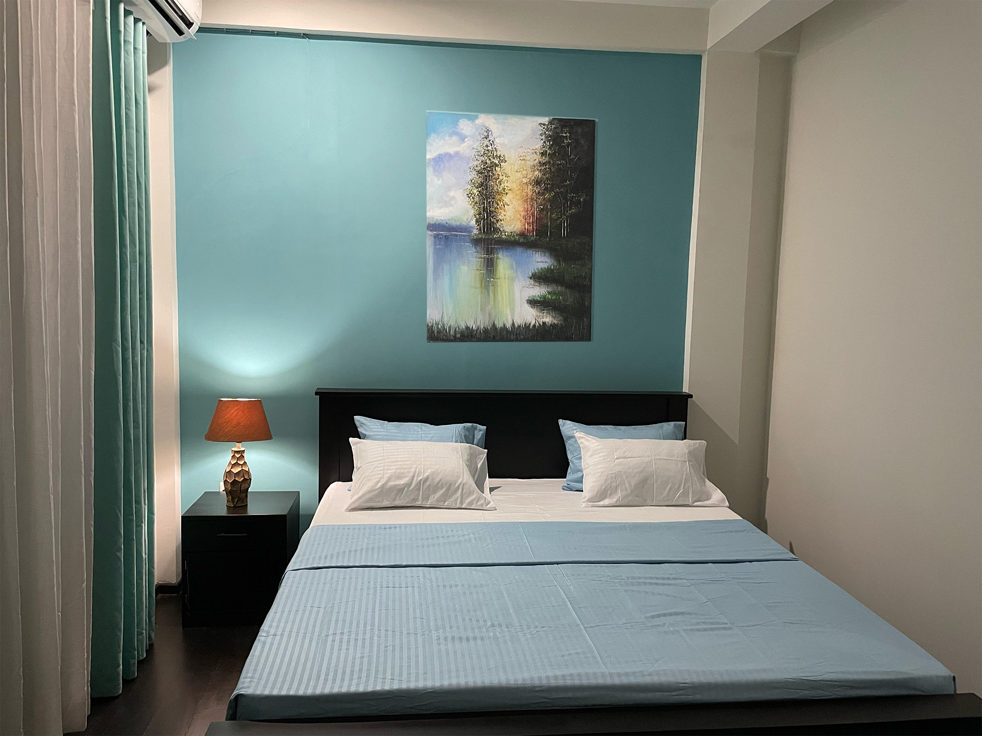 Luxurious bedroom featuring premium furnishings and sophisticated interior design